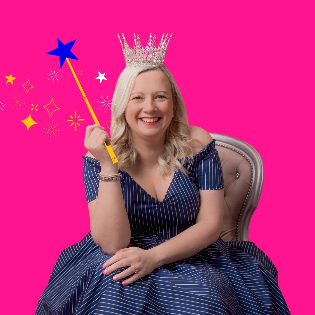 The cost of building a website - Lisa in a navy stripe dress holding a wand and wearing a crown is sitting in a chair